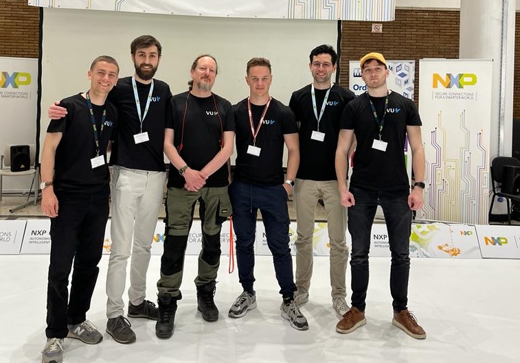 The VU MrBuggy and Convex Optimization teams in the main hall at the 2023 NXP cup finals in Bucharest