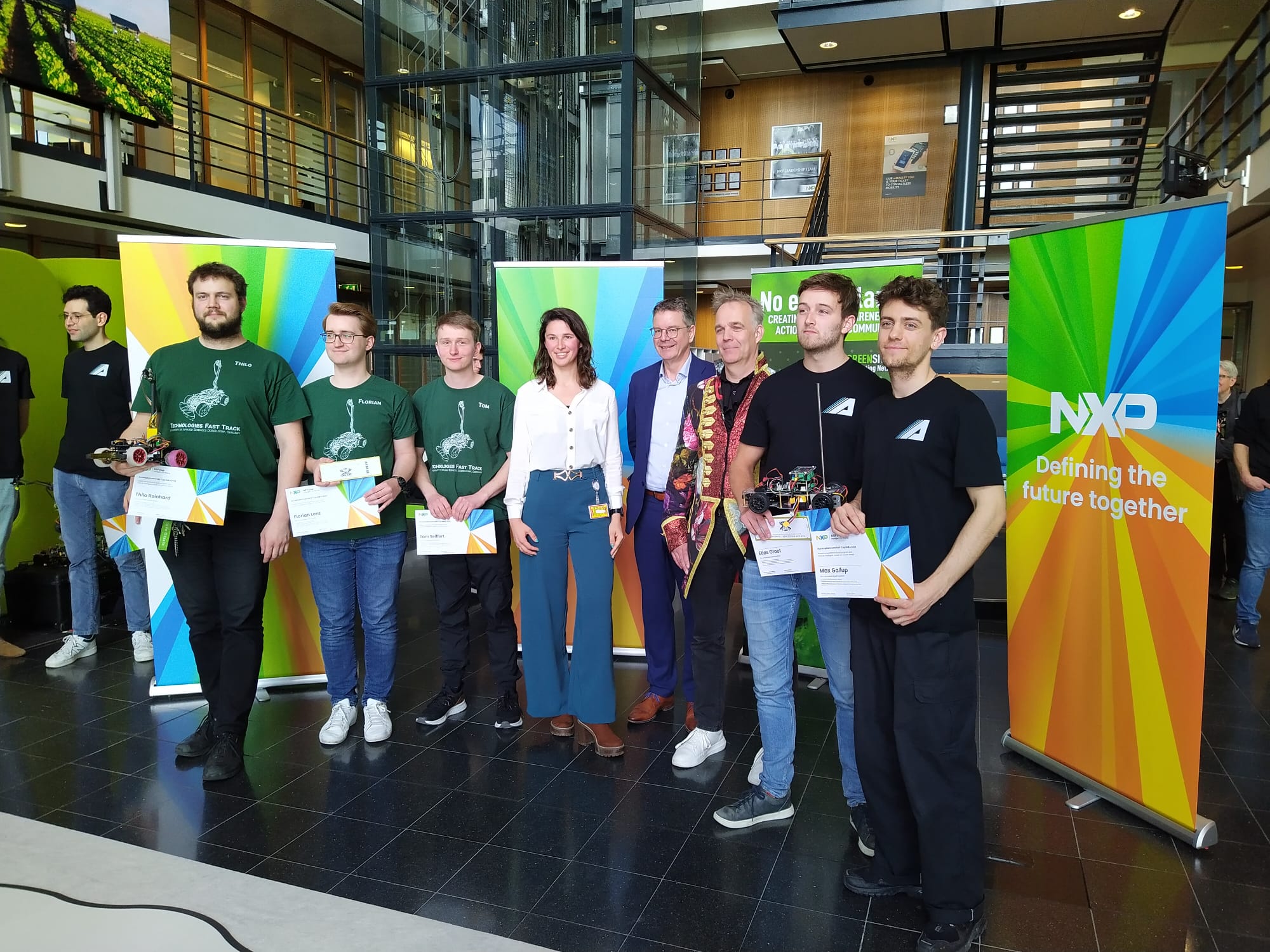 The VU ASE/Alpha team receiving tickets for the finals in Hamburg, after qualifying first place in Eindhoven