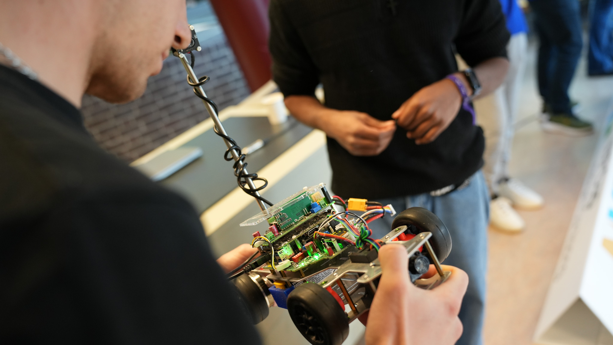 Max Gallup holding the ASE/Rover at the 2025 NXP cup qualification in Nijmegen